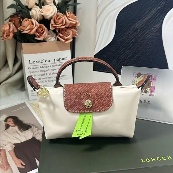 Longchamp Handbags - Longchamp Beige Nylon Mini Bag with Brown Trim